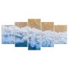 Wellen brechen am Strand im Sommer Leinwandbilder